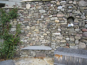Stone Retaining Wall with Stone Bench