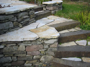 Stone Risers with Flagstone and Walls