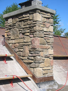 Manufactured Stone Chimney with Concrete Cap